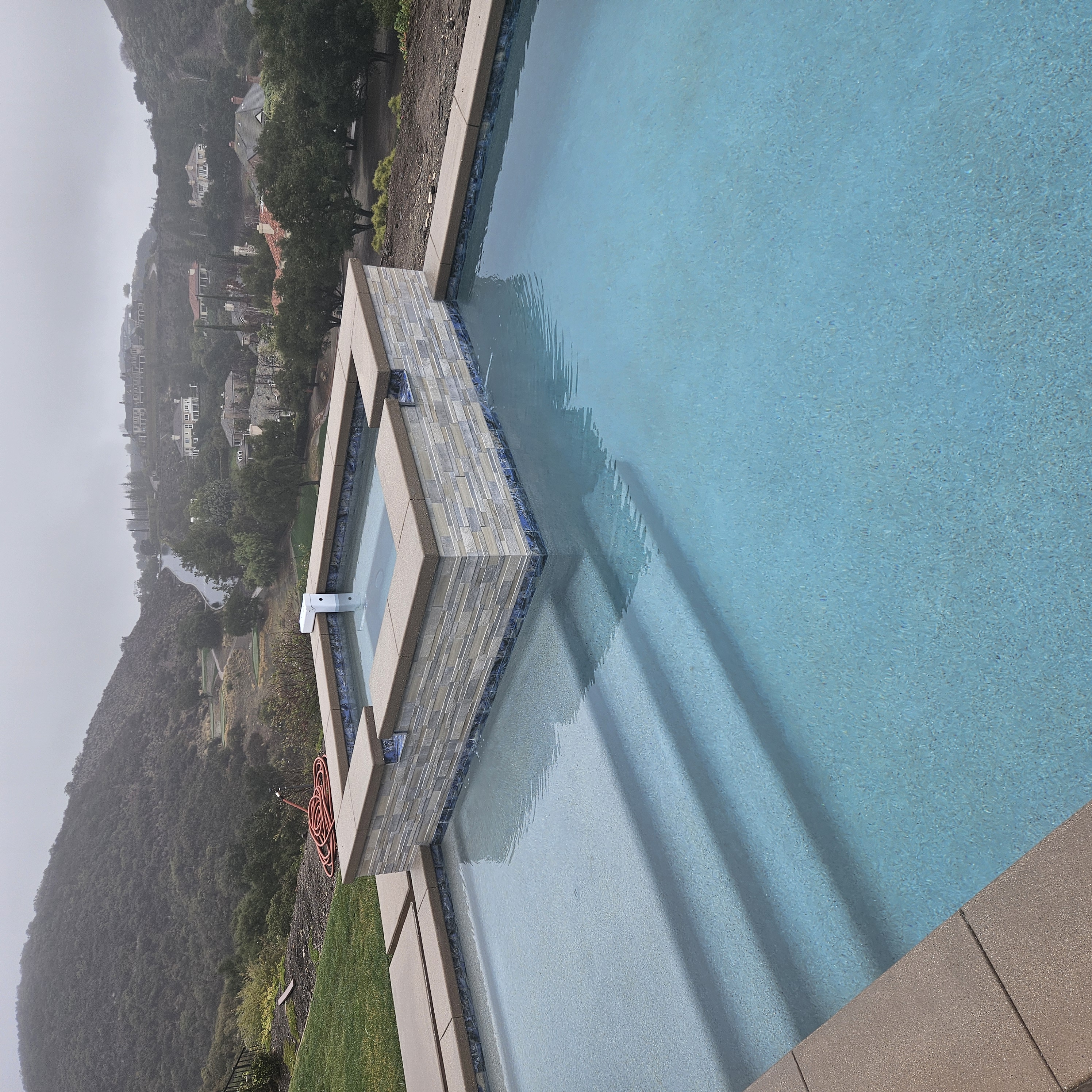 Pool with Raised Spa and Tile Work